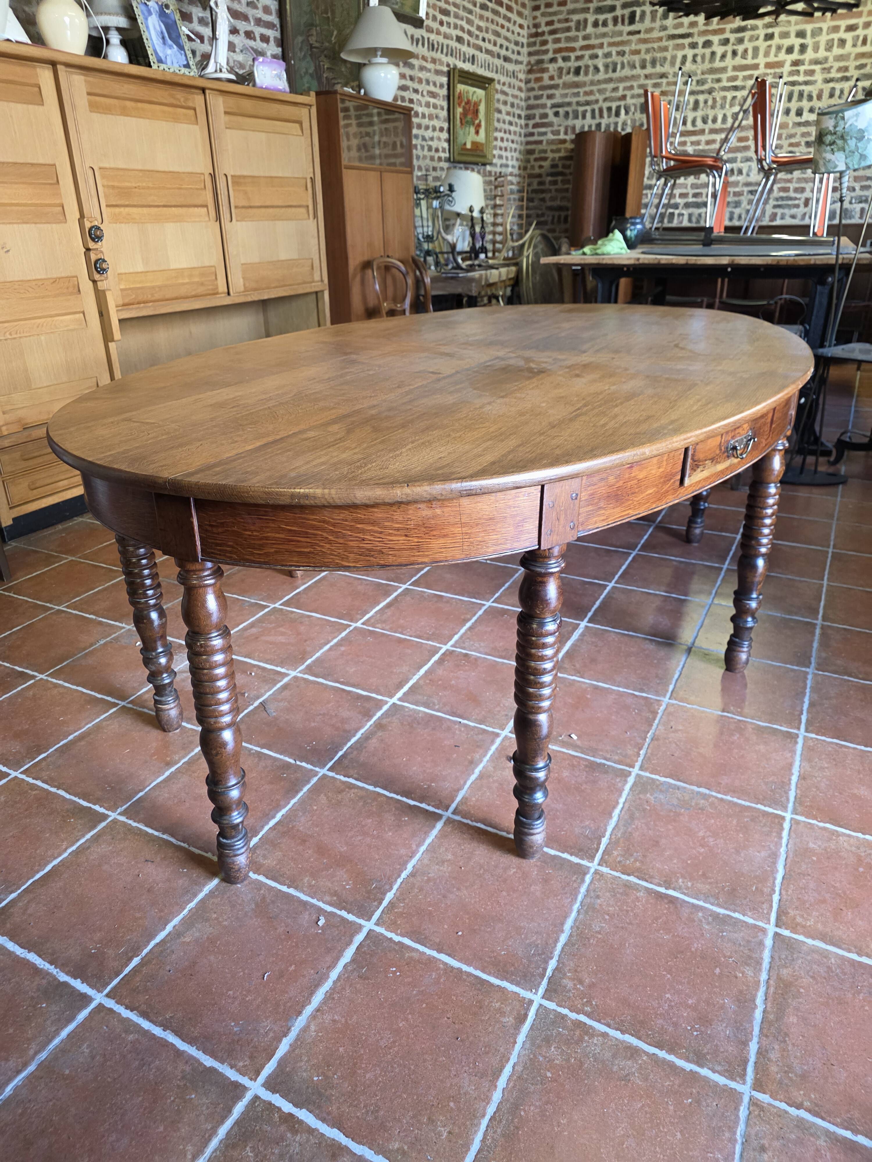 Large oval monastery table in solid oak, 19th century, 243×154cm