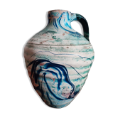 Terracotta vase with a marbled finish.
