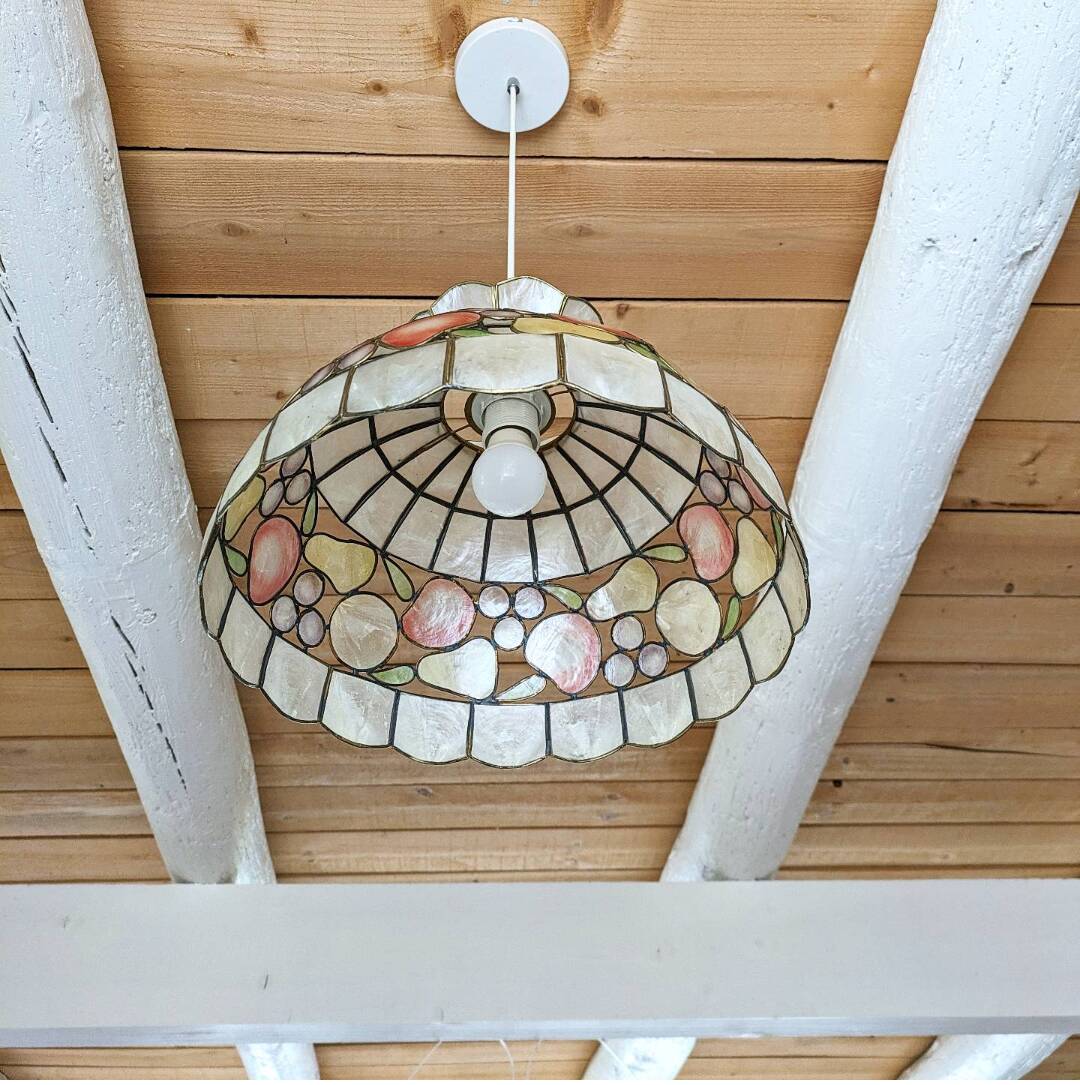 Vintage mother-of-pearl and brass pendant light.