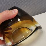Glass vase in multiple layers of glass, in translucent, amber, yellow colours and shades.