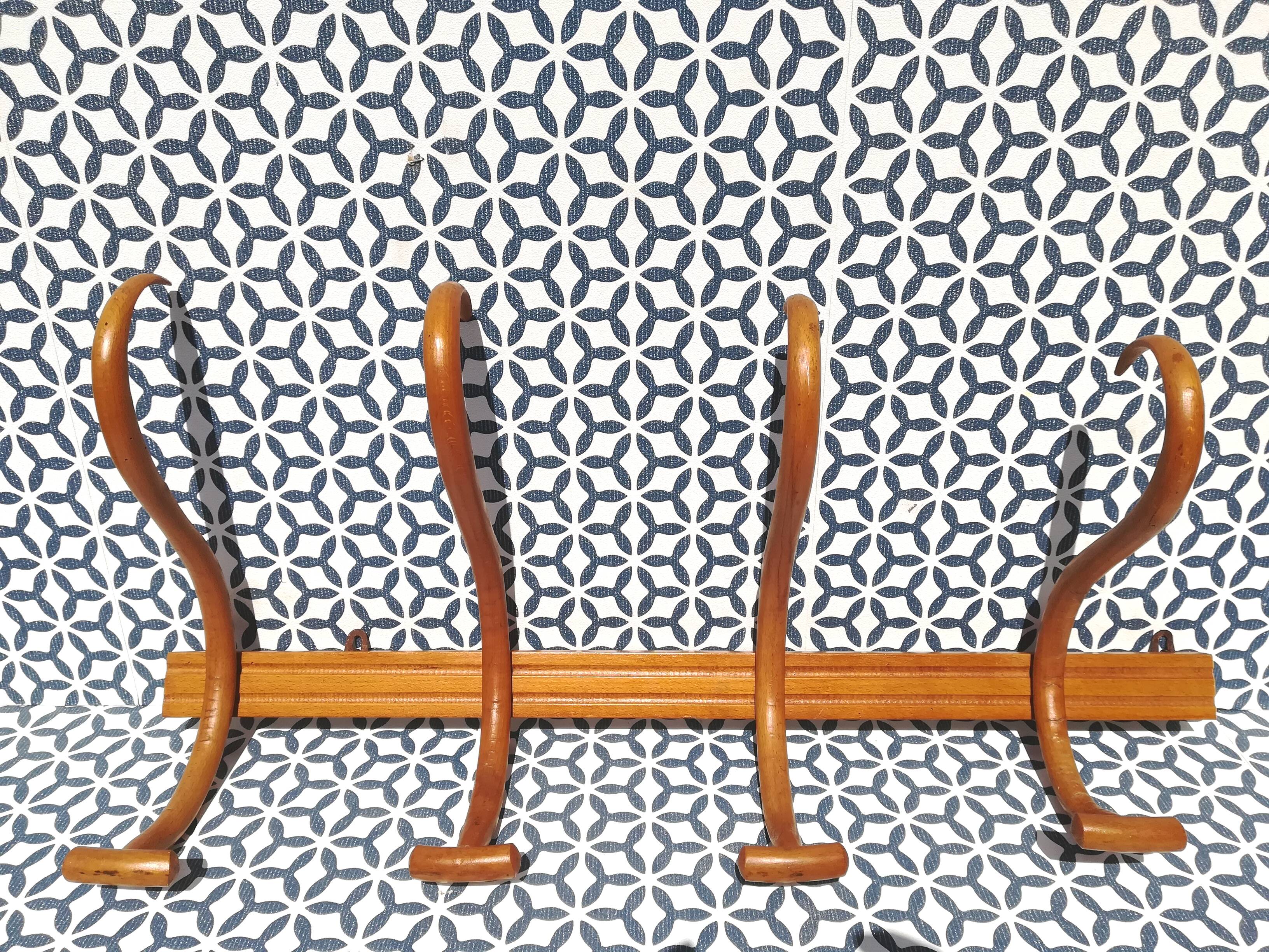 Patère wears Mahieu coat