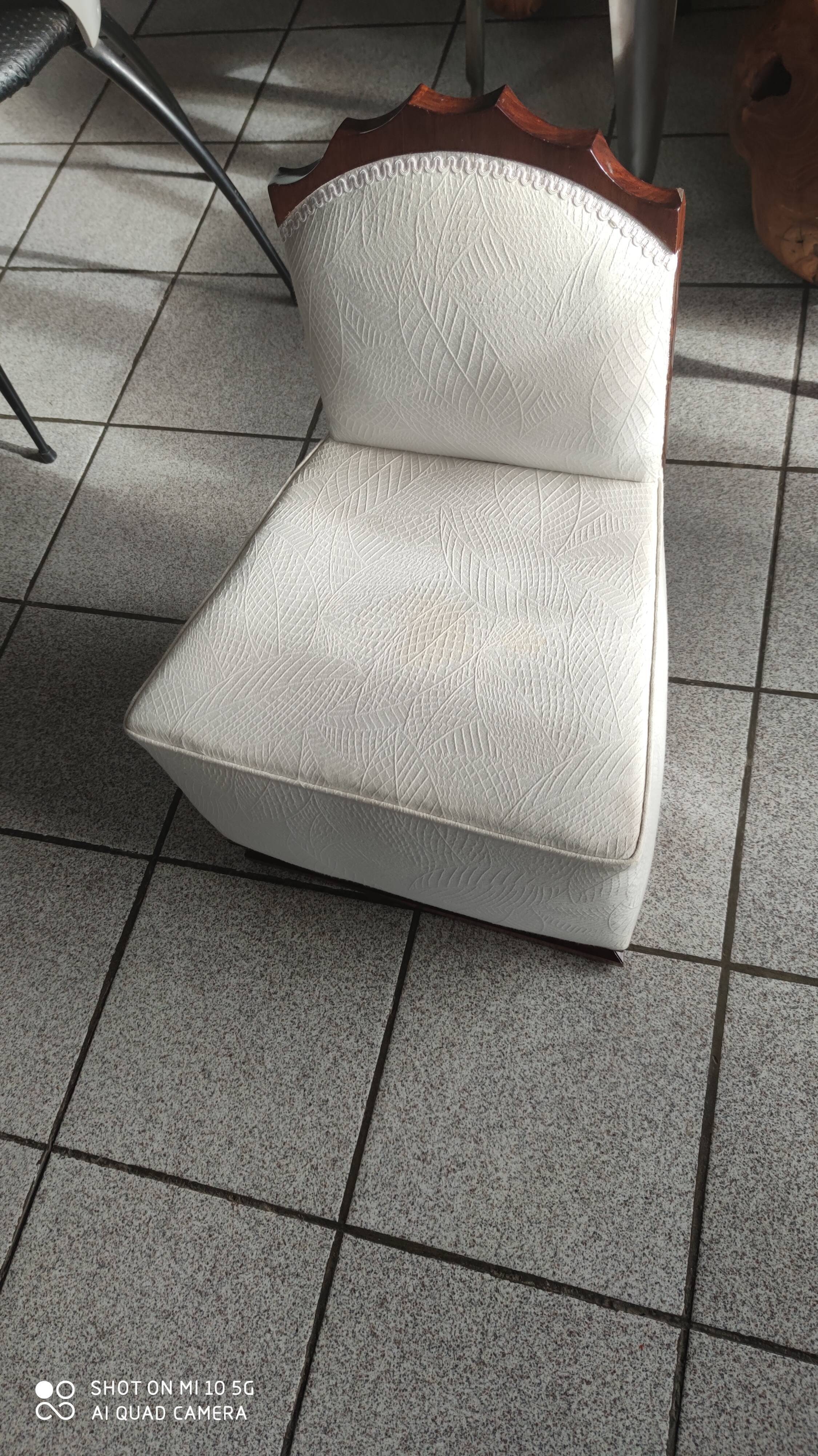 Charming decorative arts period armchair in solid walnut