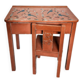 Terracotta school desk and chair.