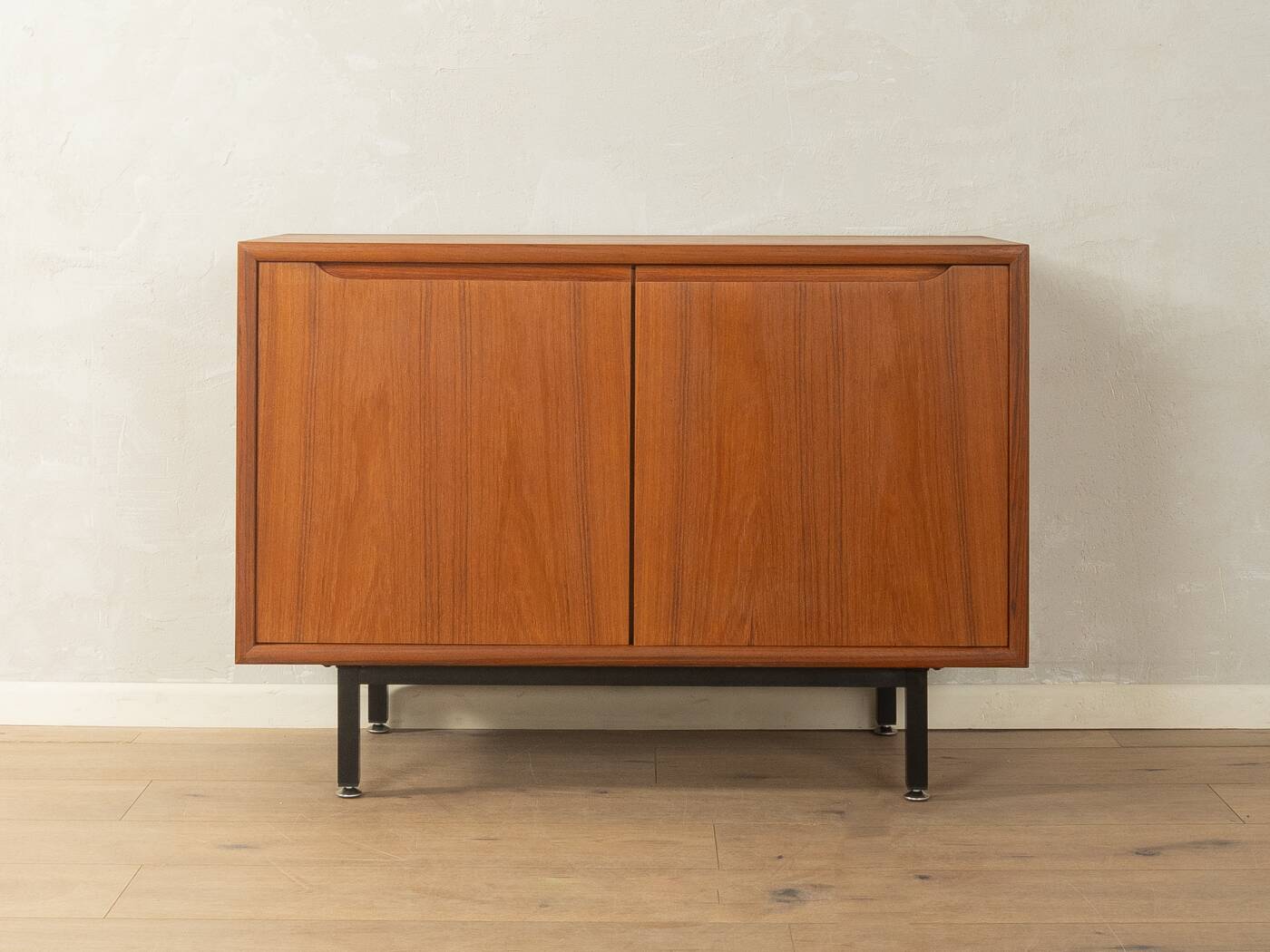 Classic chest of drawers from the 1960s with practical, closed storage space