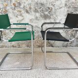 Pair of armchairs, tubular structures and imitation leather