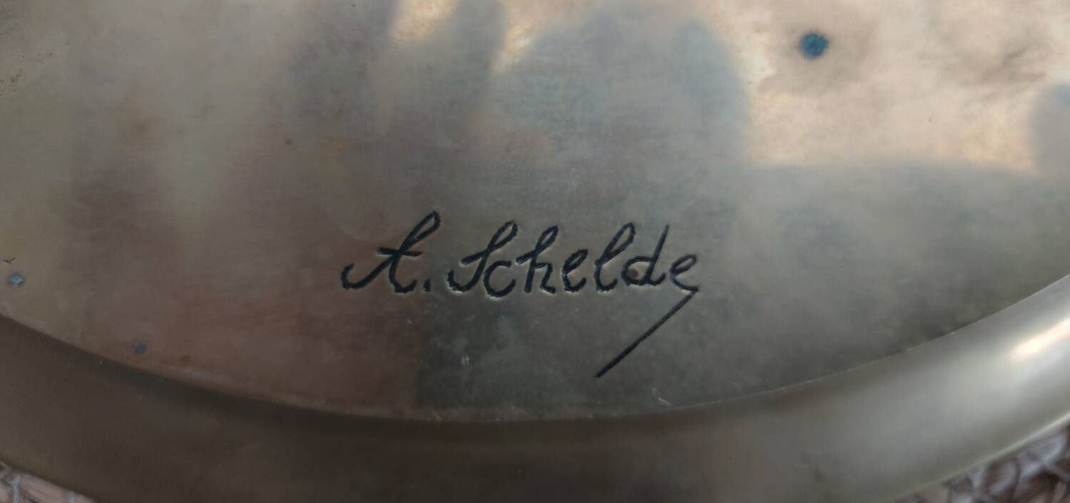 Oval enamelled plate signed A Schelde