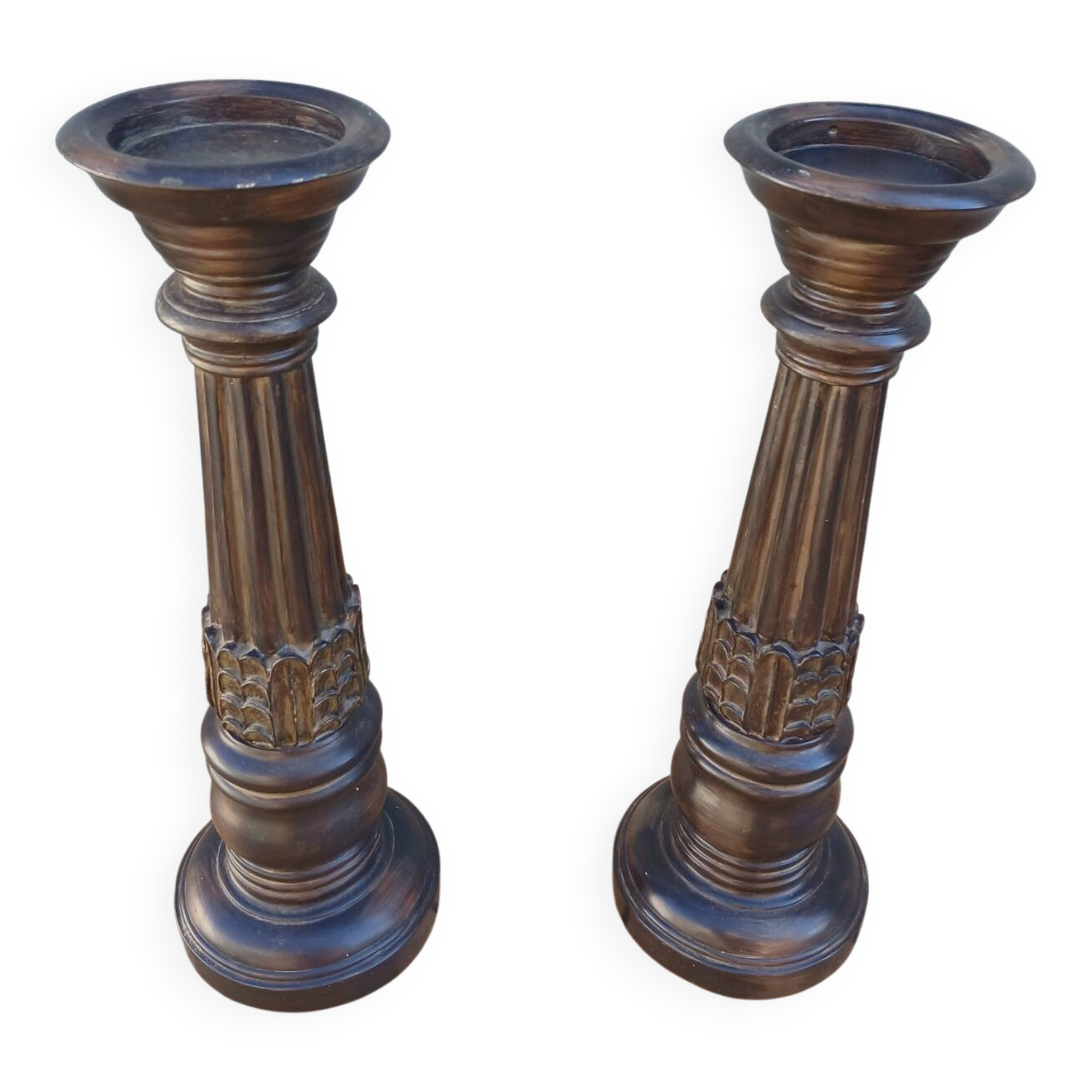 2 carved wooden candlesticks
