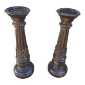 2 carved wooden candlesticks