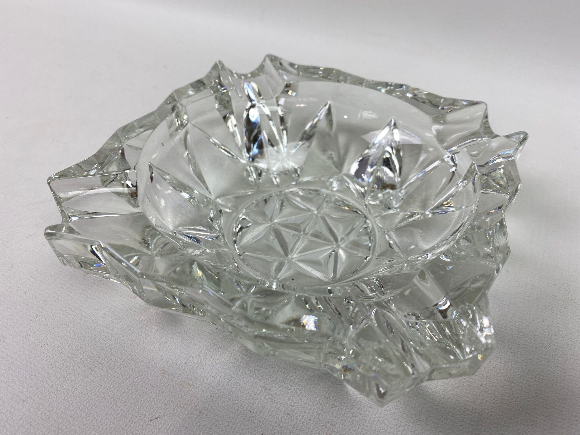 Carved glass ashtray