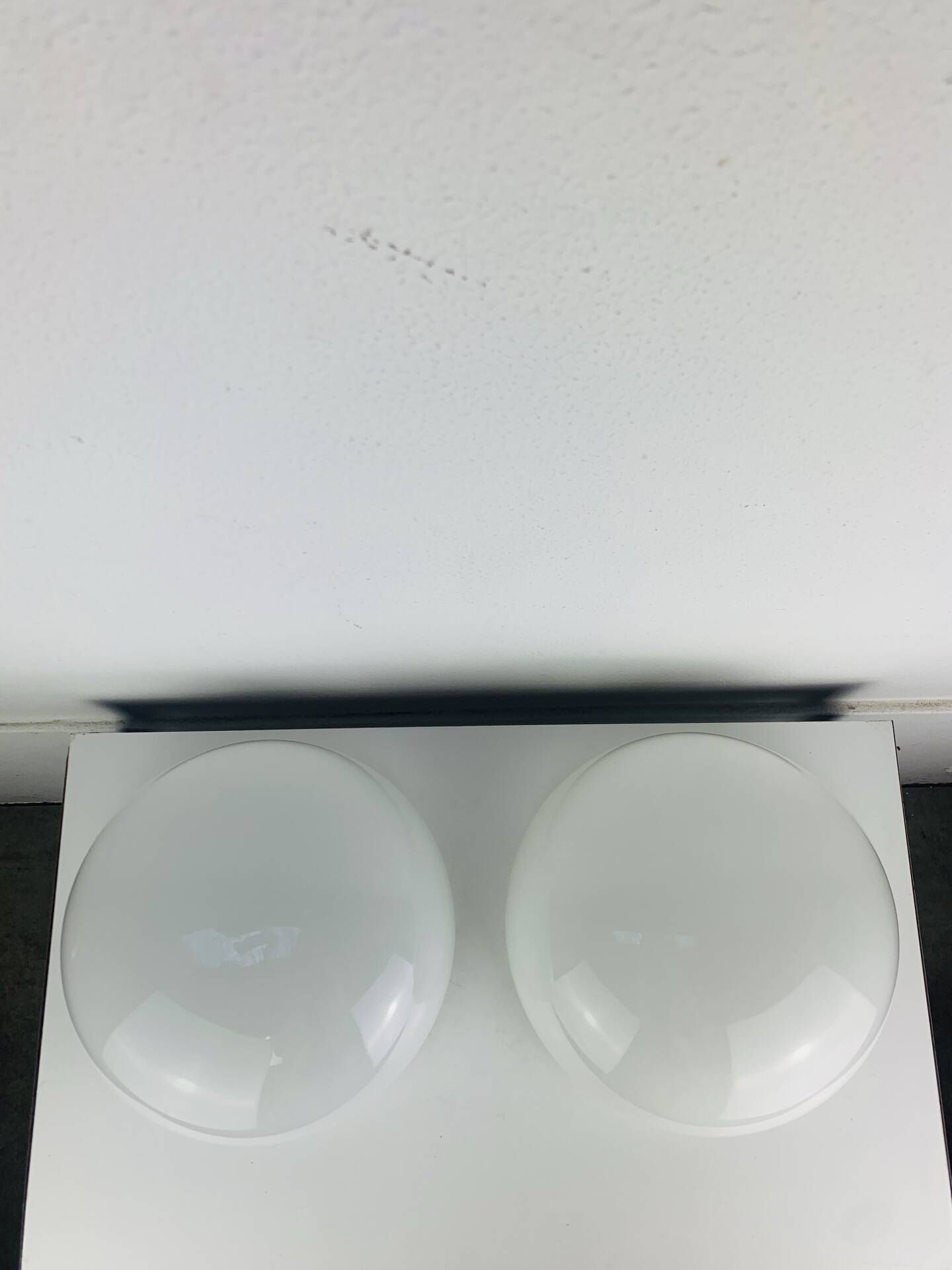 Pair of half-sphere wall lights in white opaline, Italy 1960