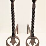 Pair of sculptural cast iron chenets with twisted heads