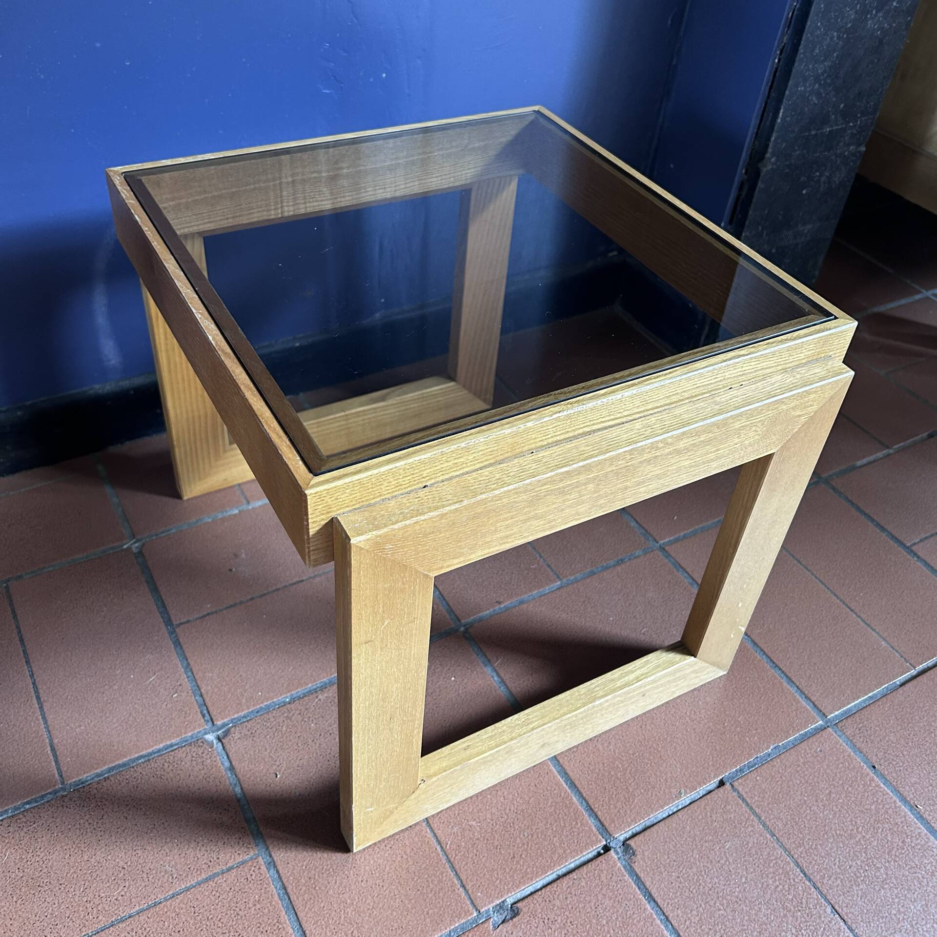 Modernist side table in wood and smoked glass