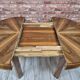 Walnut extendable round table after professional restoration. Art deco.