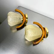 Pair of pear-shaped "Cocoon" wall sconces, resin and pine wood, Italy, 1970s
