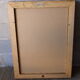 Miroir en bois doré biseauté