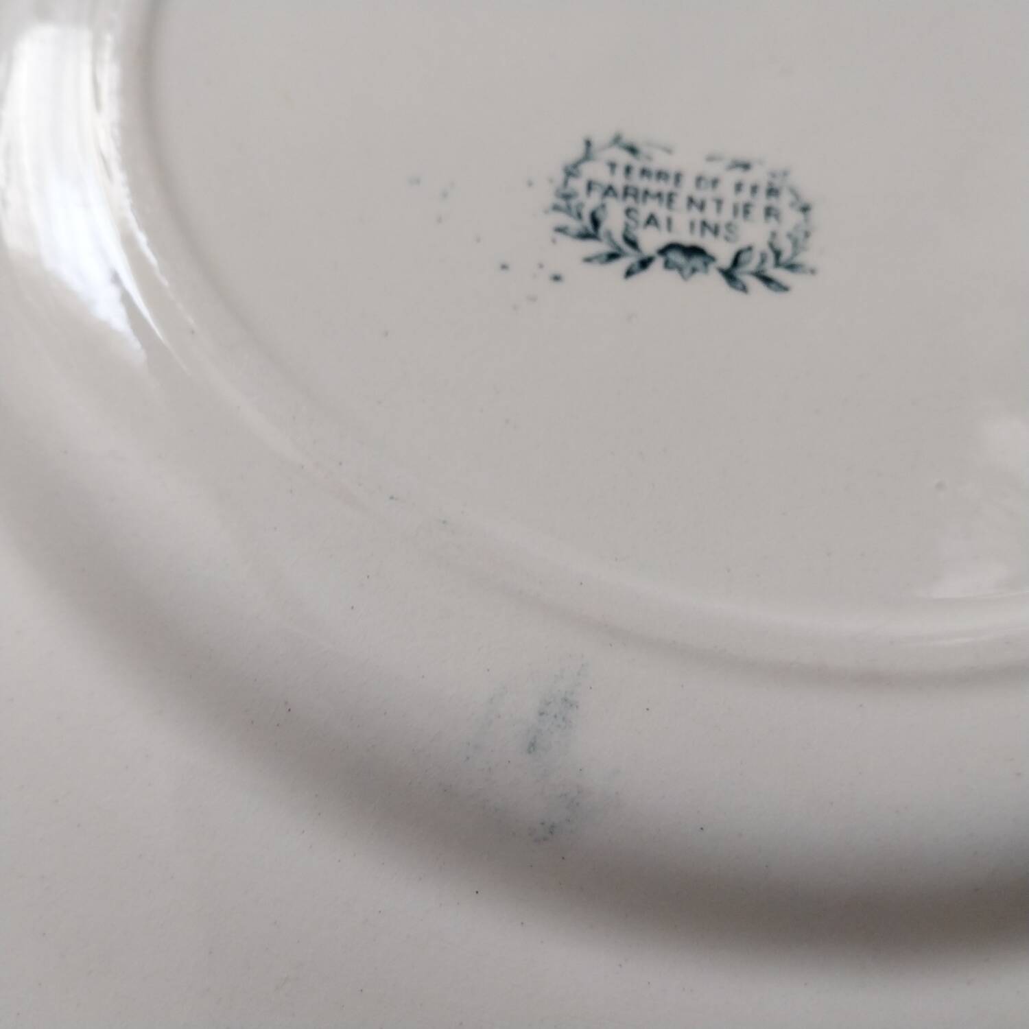 Old large iron earth dish Parmentier Salins