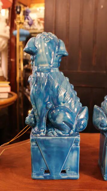 Pair of Foo dog bookends in turquoise glazed ceramic, Manises