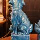Pair of Foo dog bookends in turquoise glazed ceramic, Manises