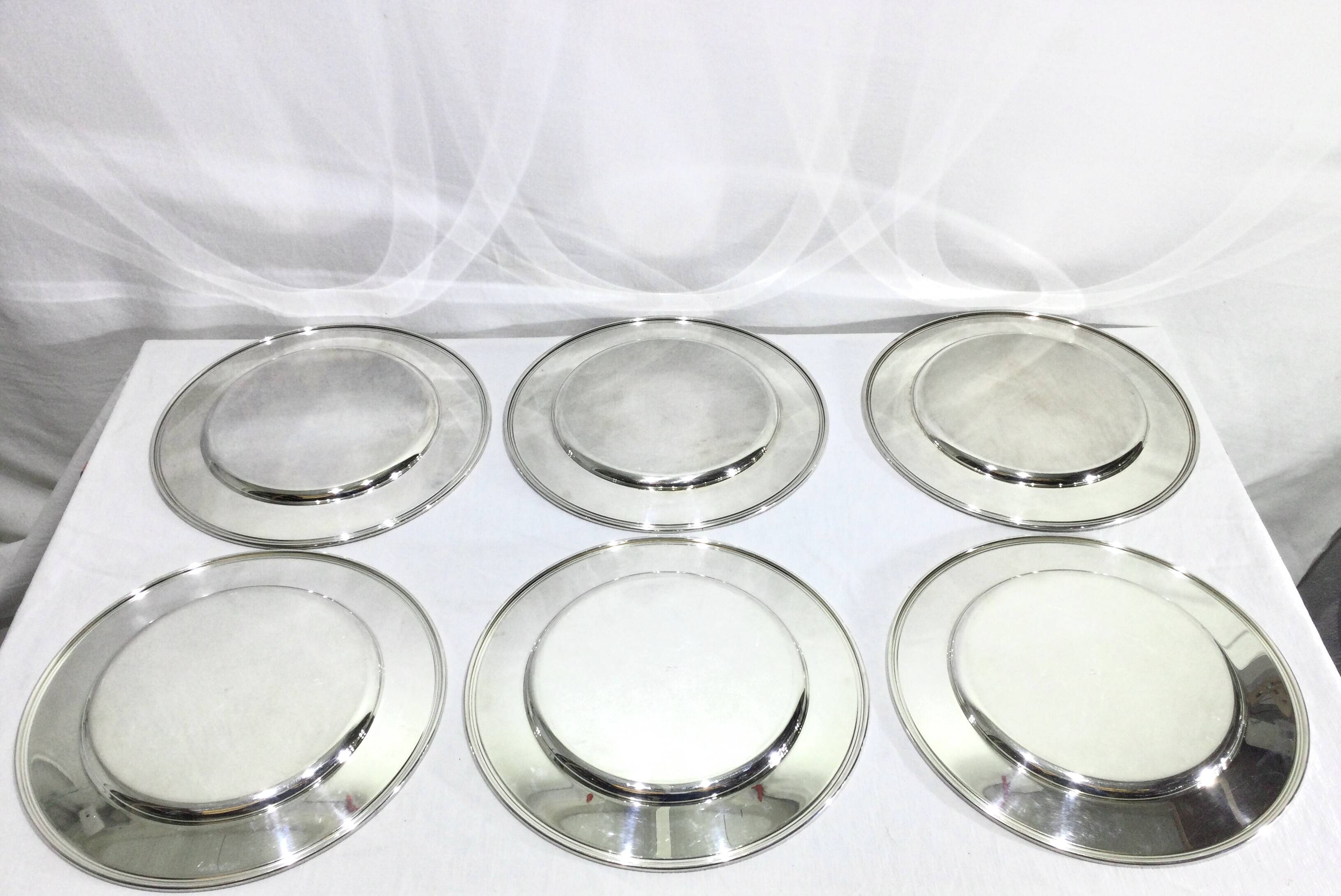 Set of silver-plated serving dishes and bells