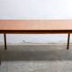 Extendable teak dining table by Gérard Guermonprez for Magnani editions