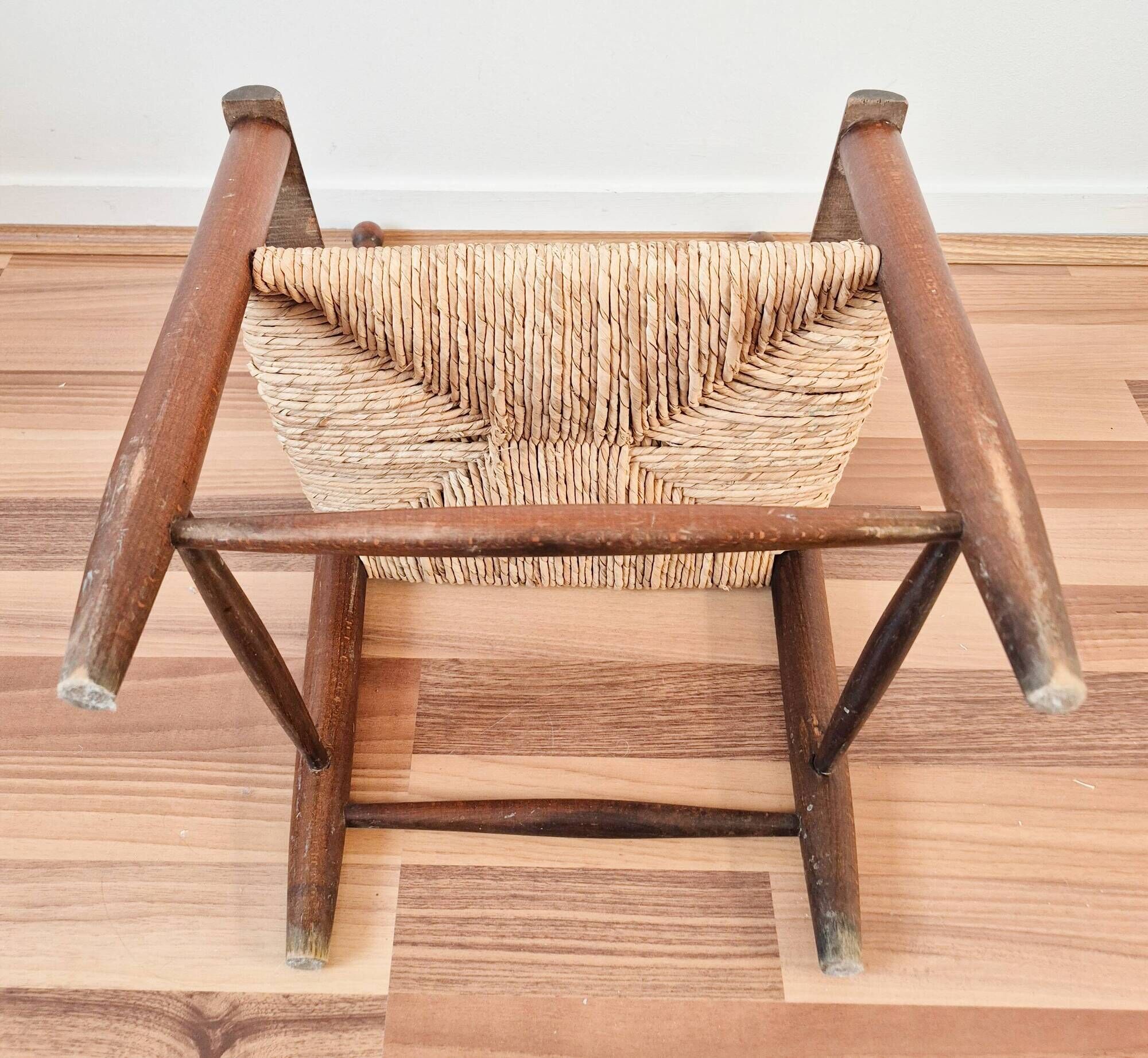 Vintage wooden and straw children's armchair, 1950s.