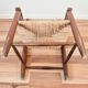 Vintage wooden and straw children's armchair, 1950s.
