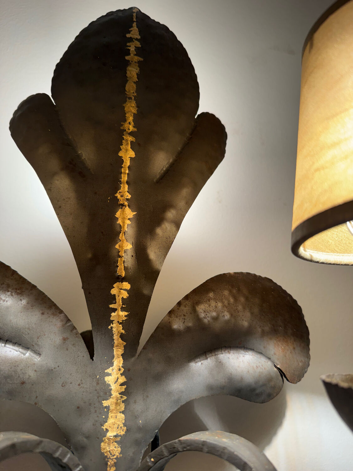 Large lily flower wrought iron wall light from the 1960s.