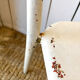 Pair of white metal bistro chairs