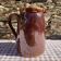 Old glazed terracotta pitcher