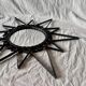 Old wrought metal sun mirror