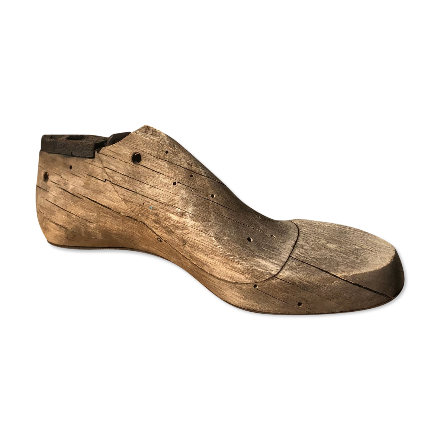 Old wooden and metal shoe tree