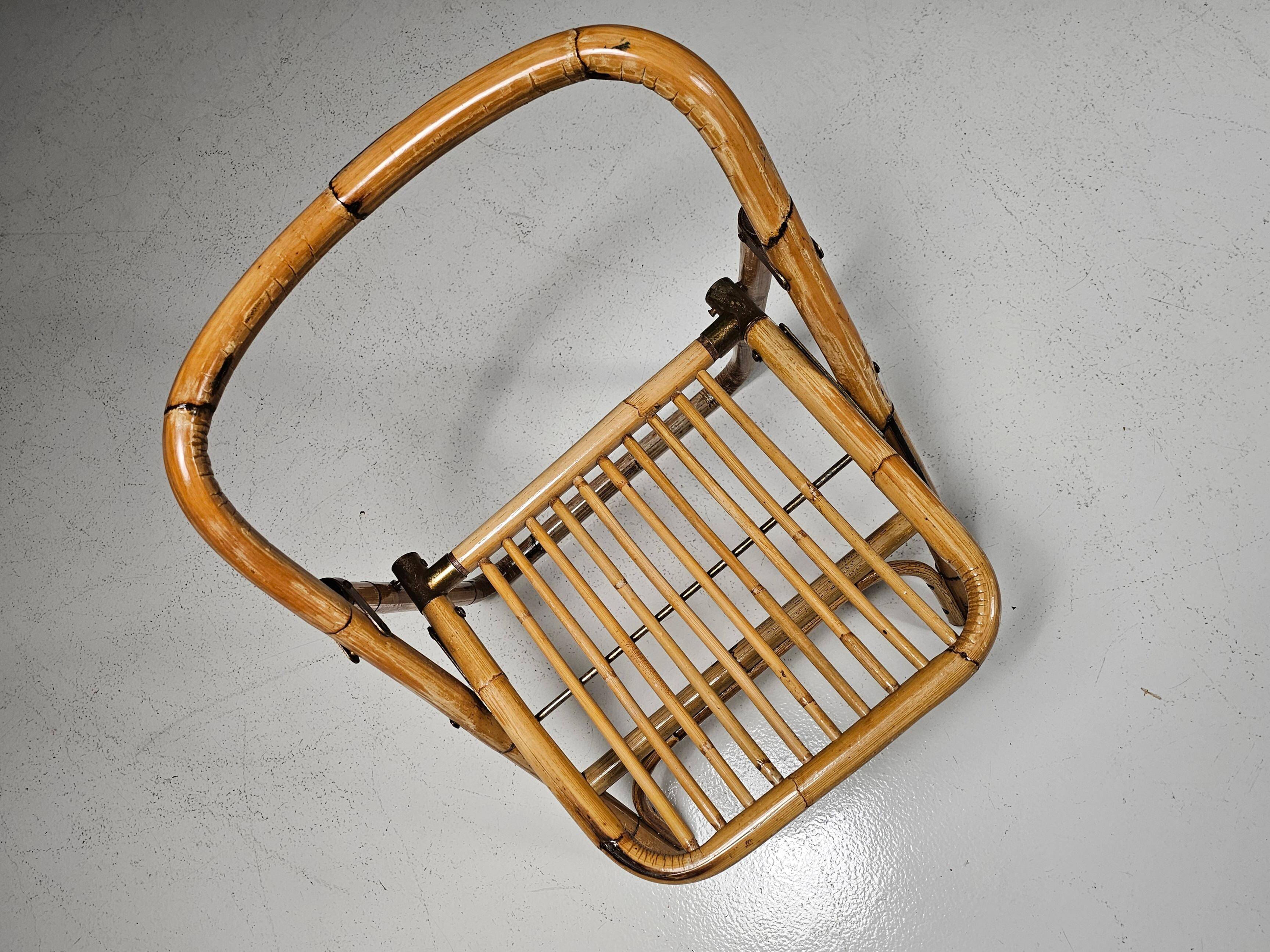 Set of 4 Dal Vera bamboo folding chairs, brass details, Italy, 1960s.