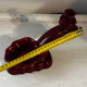 Ruby red ceramic pocket ashtray from Vallauris, numbered.