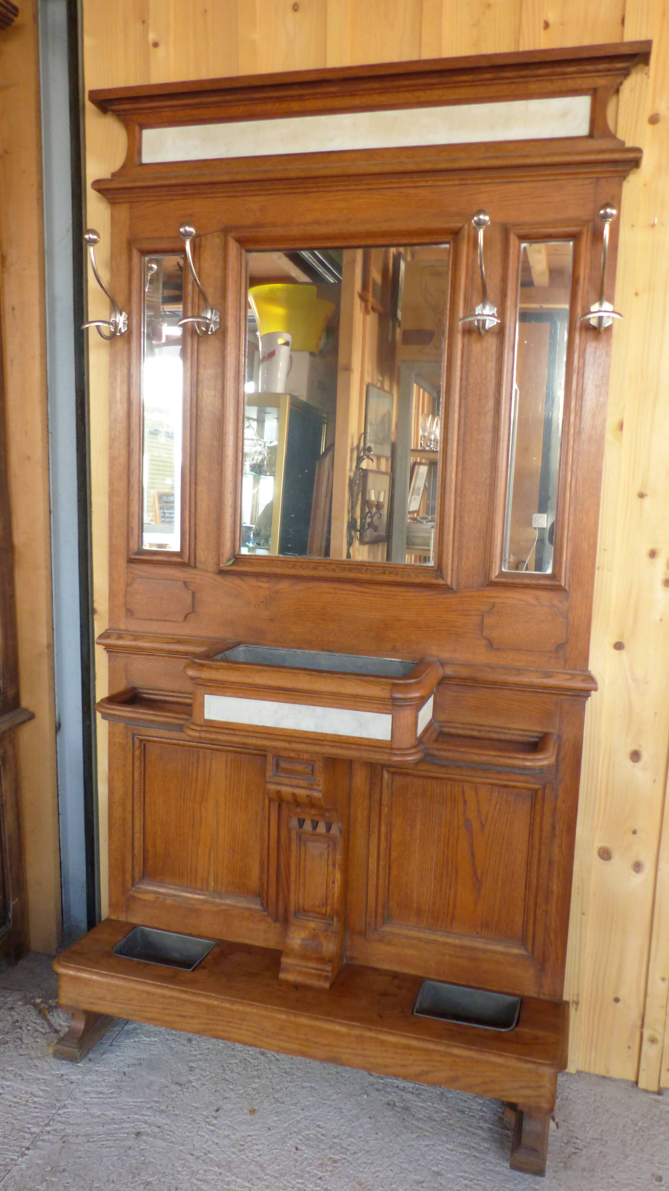 Oak and marble wall coat sores door