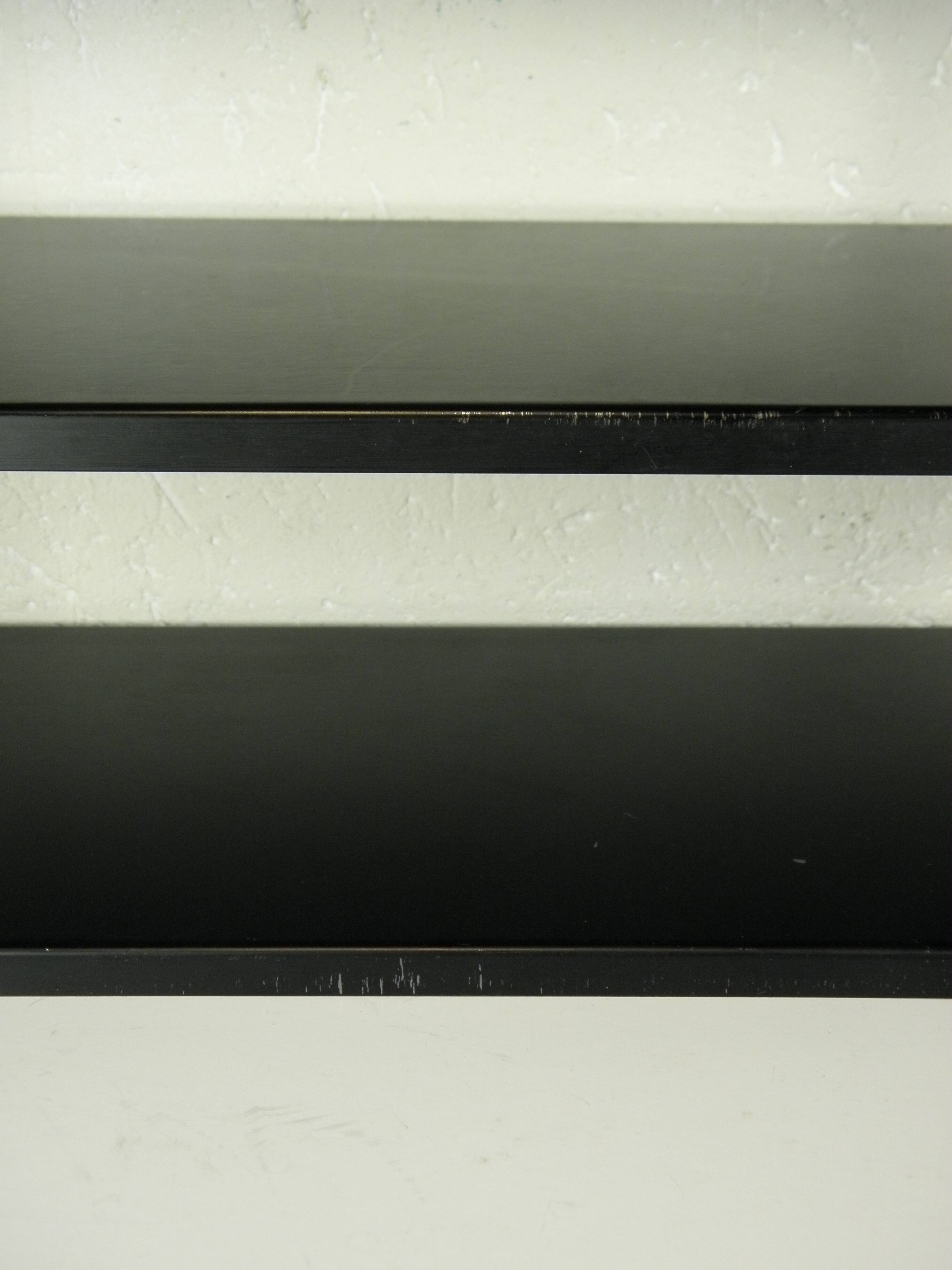 Black and gold metal wall shelf from the 1960s