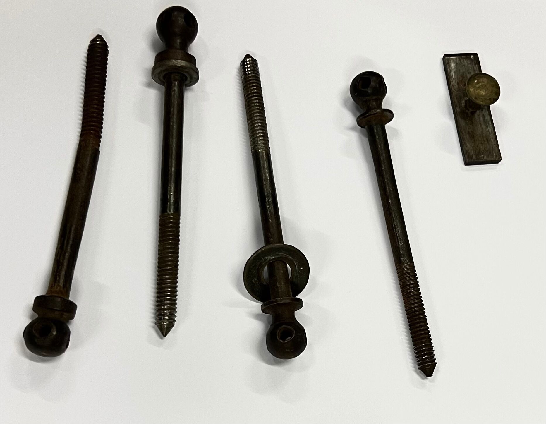 Old children's bed with retractable walnut bars