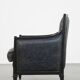 Armchair in black cowhide leather and wood with an Art Deco design