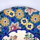 Assiette Longwy 1930 – Émaux à décor d’oiseaux et fleurs oranges