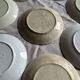 Set of eight flat dessert plates in barbotine earthenware with grape decoration – circa 1900.