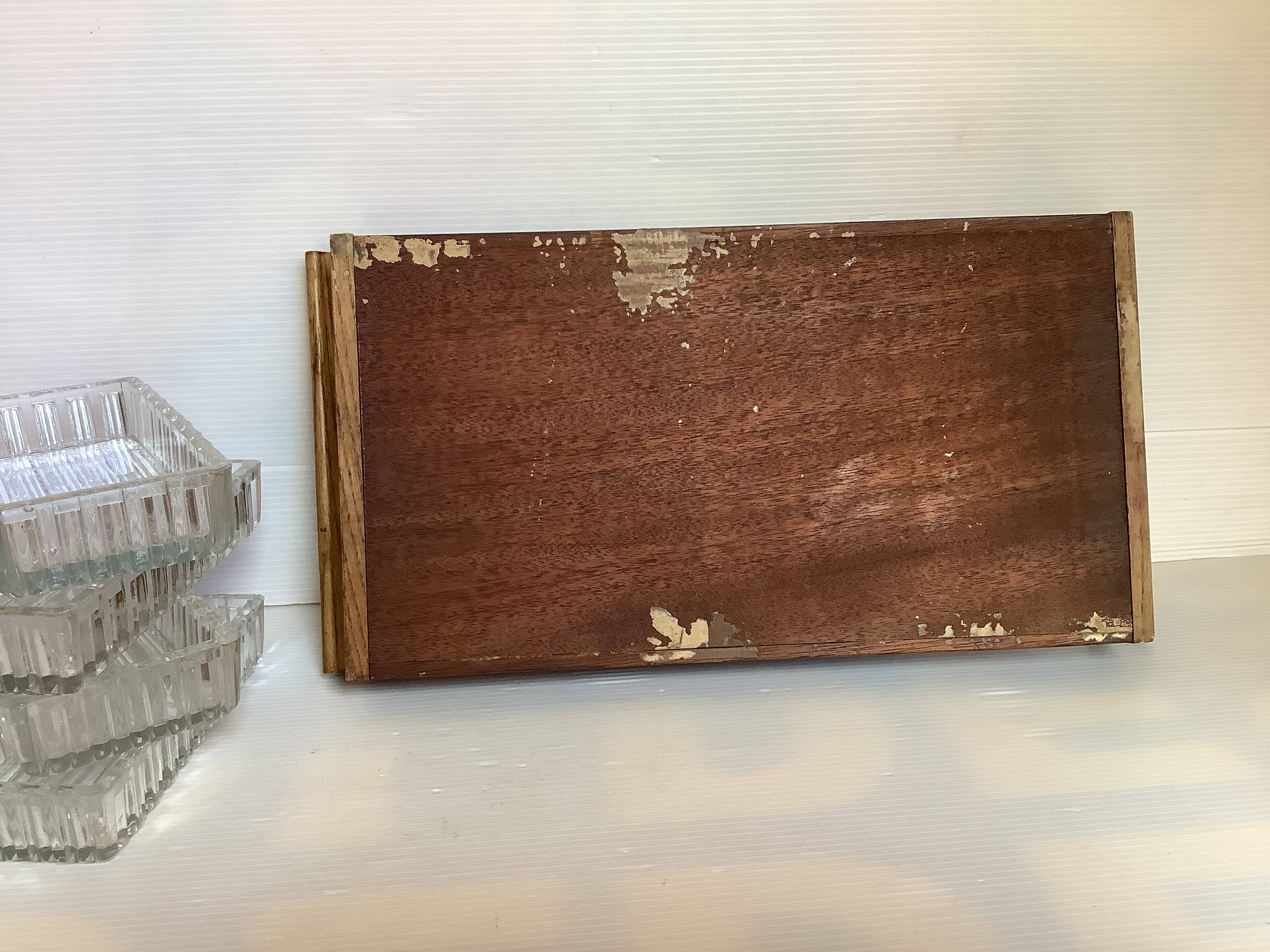 Old wooden serving tray and molded glass bowls