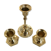 Set of three candlesticks in brass