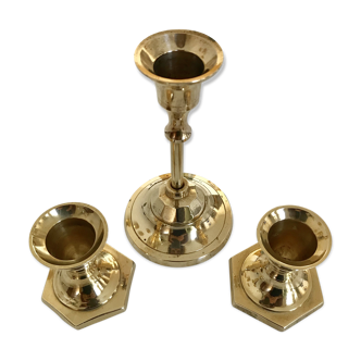 Set of three candlesticks in brass