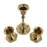 Set of three candlesticks in brass