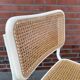 Cesca dining room chair designed by Marcel Breuer