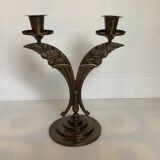 Candle holders in the shape of art deco butterfly wings