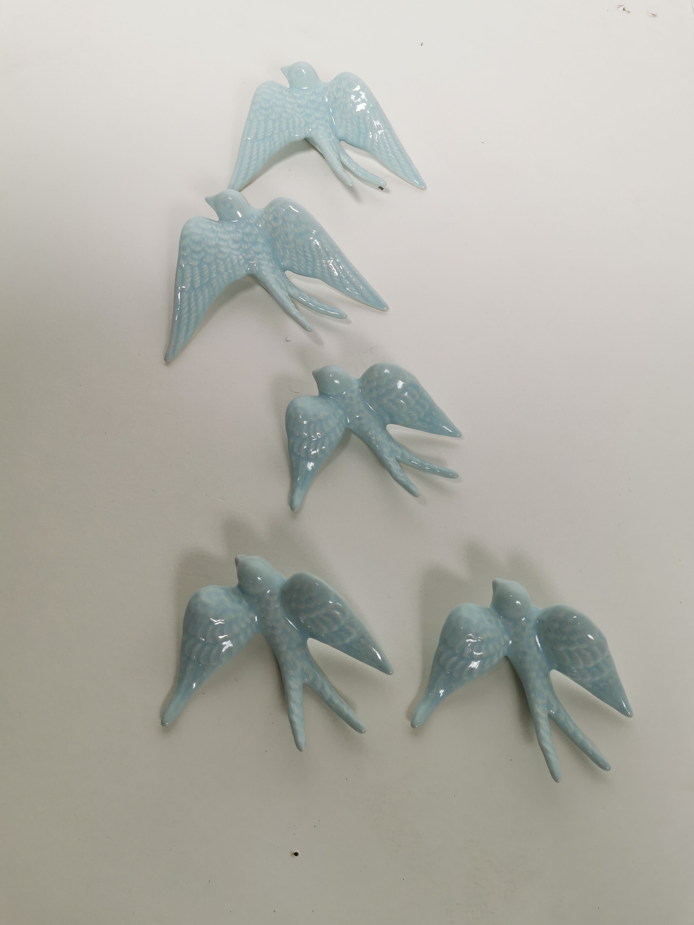 Batch of swallows in ceramic