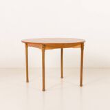 Teak round table with hidden extension, 1970s