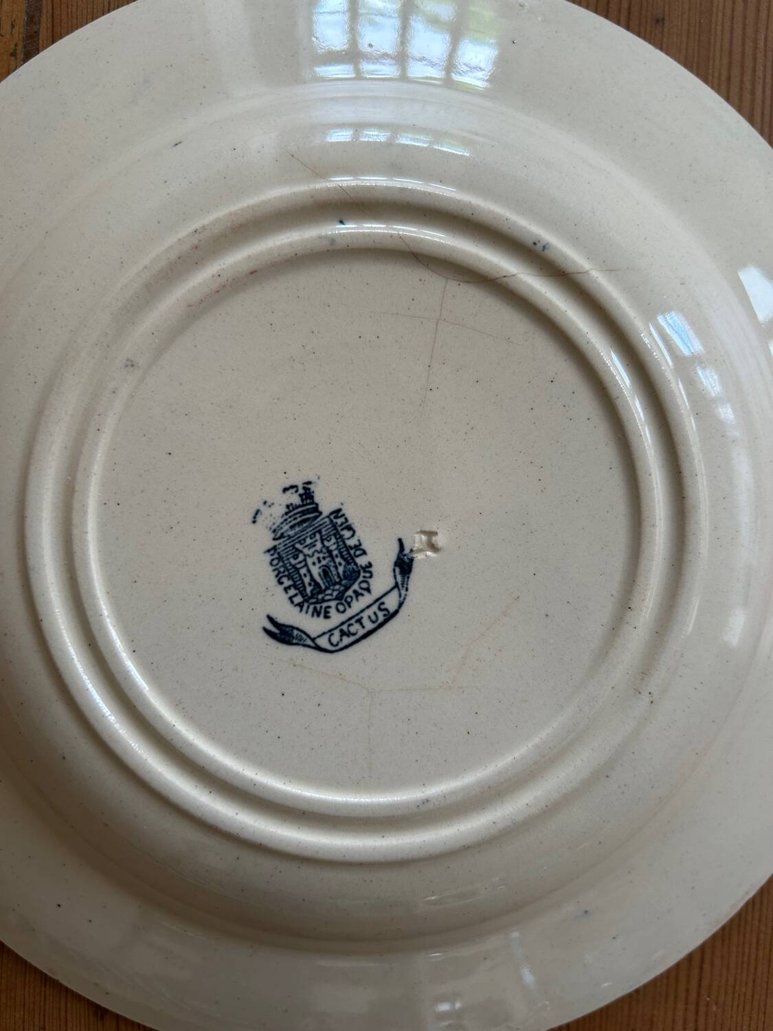 Series of 4 mismatched soup plates “Terre de Fer”