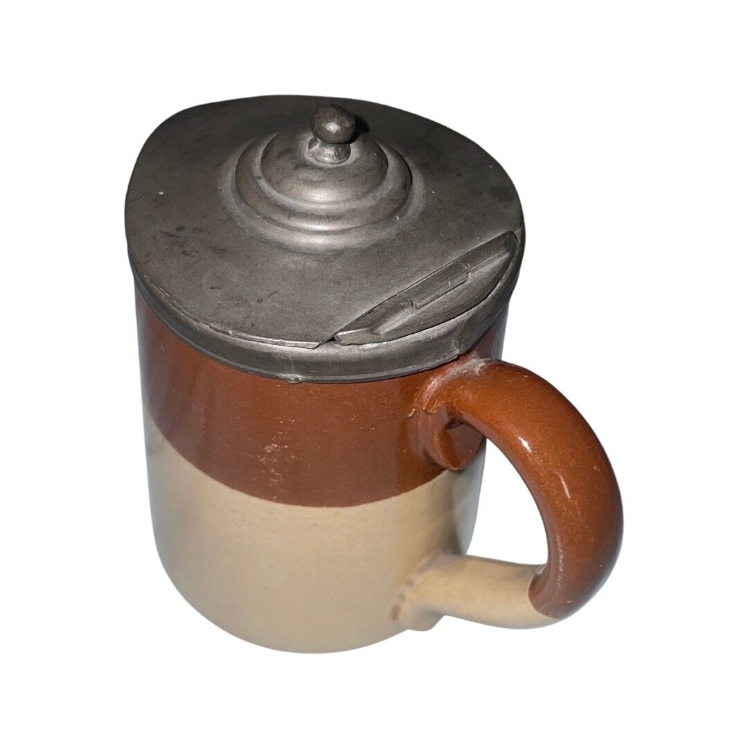 Small beige brown English earthenware milk jug