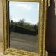 Antique mercury mirror in the Napoleon III style.